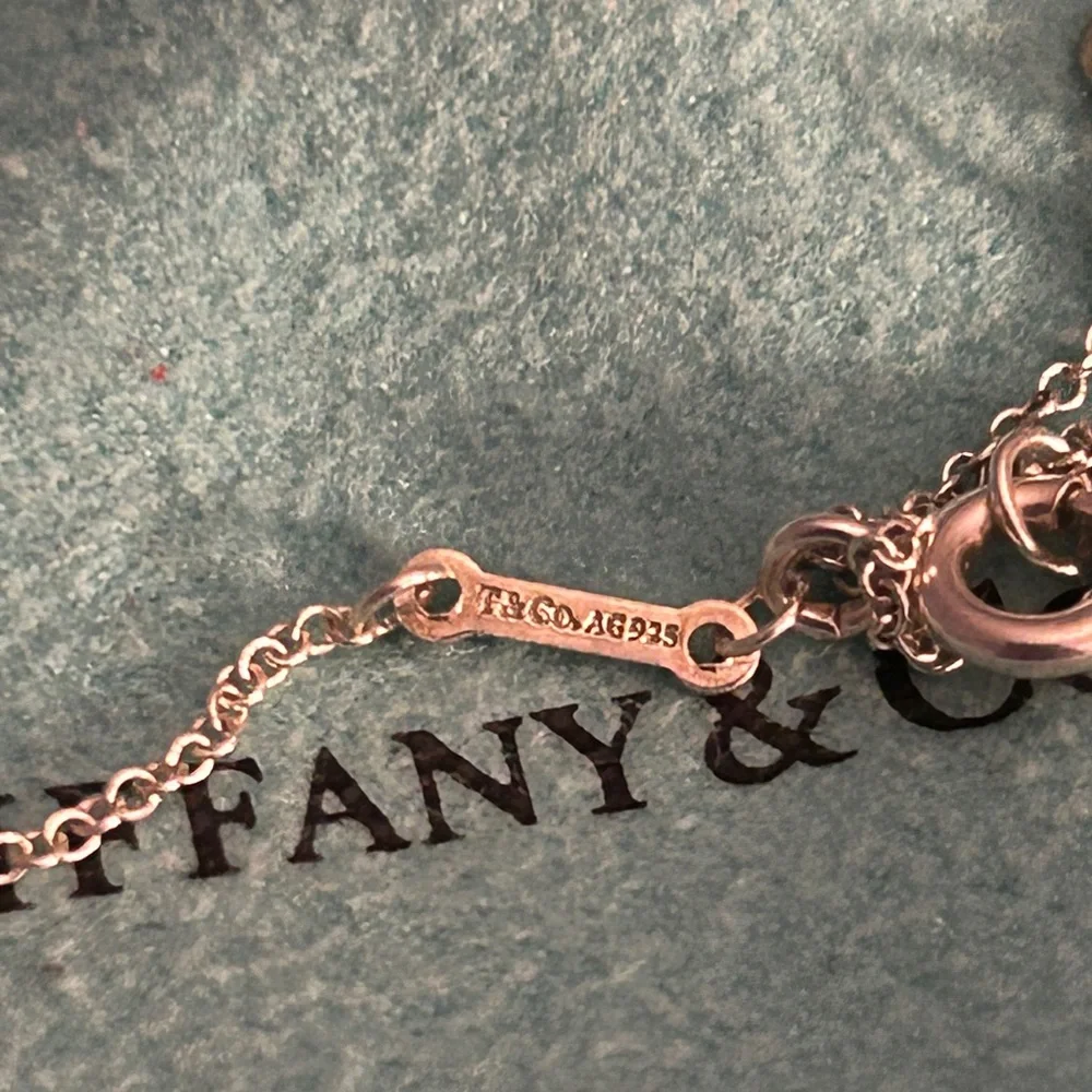 Sold! Tiffany & Co. Silver Arrow Necklace. Hallmarked:
"T & Co. - Picture 6 of 10